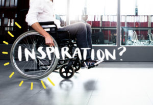 Man in wheelchair with text that reads "Inspiration?"